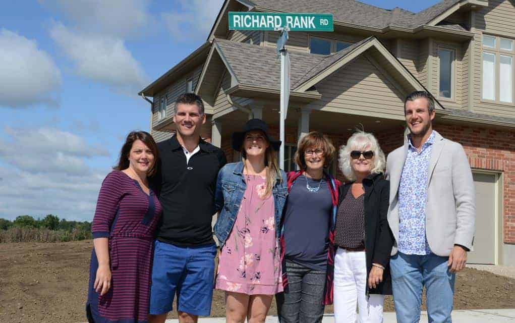 
                     The Township of Woolwich dedicated an intersection in an Elmira subdivision to Richard Rank at a ceremony Aug. 31 in front of
                     