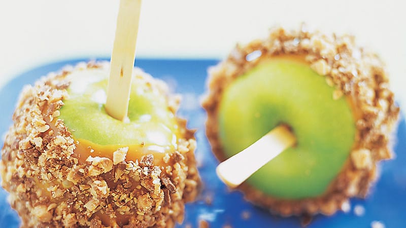                      Leftover Halloween candy makes a great coating for caramel apples                             
                     