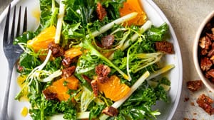 Accompanied by pops of vibrant citrus, kale salad can brighten your day