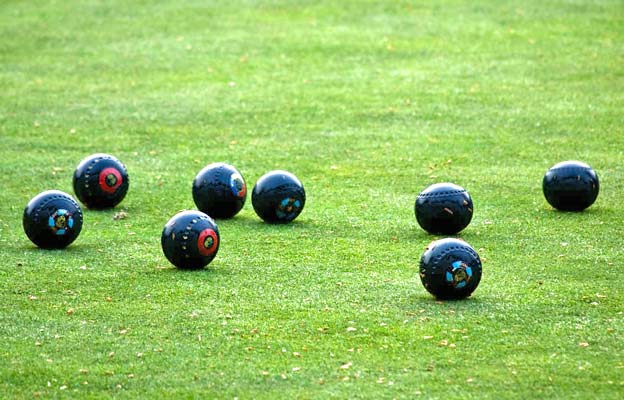 Lawn bowlers waiting for things to green up