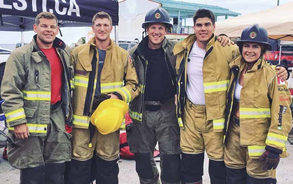 
                     Dave Uberig, Wes Balfour, Steve Grein, Clayton Greer and Madison Lavigne following their relay completion at the FireFit comp
                     