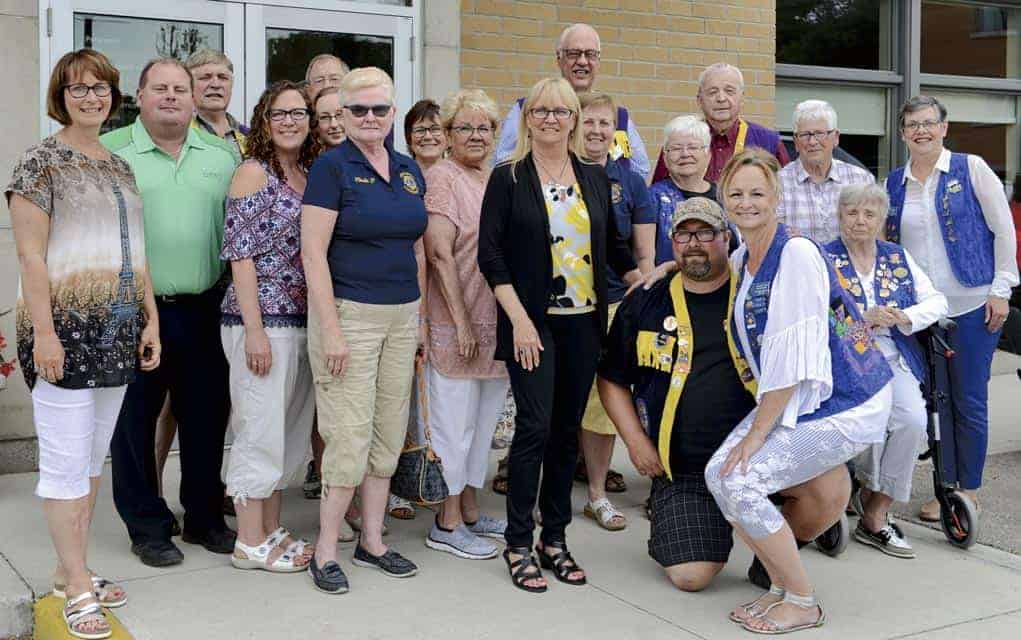
                     Woolwich Mayor Sandy Shantz (left) joined members of both the Elmira Lions and Woolwich Community Lions clubs as well as the 
                     