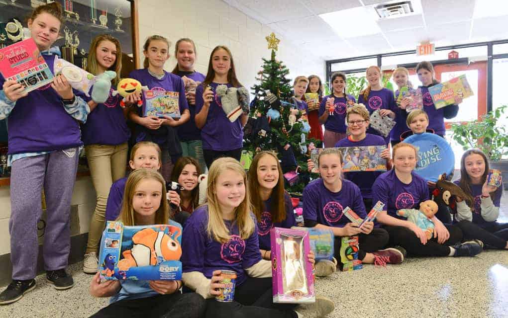 
                     Park Manor Senior Public School student council students show off their Week of Giving items in the school’s front foyer. Fro
                     