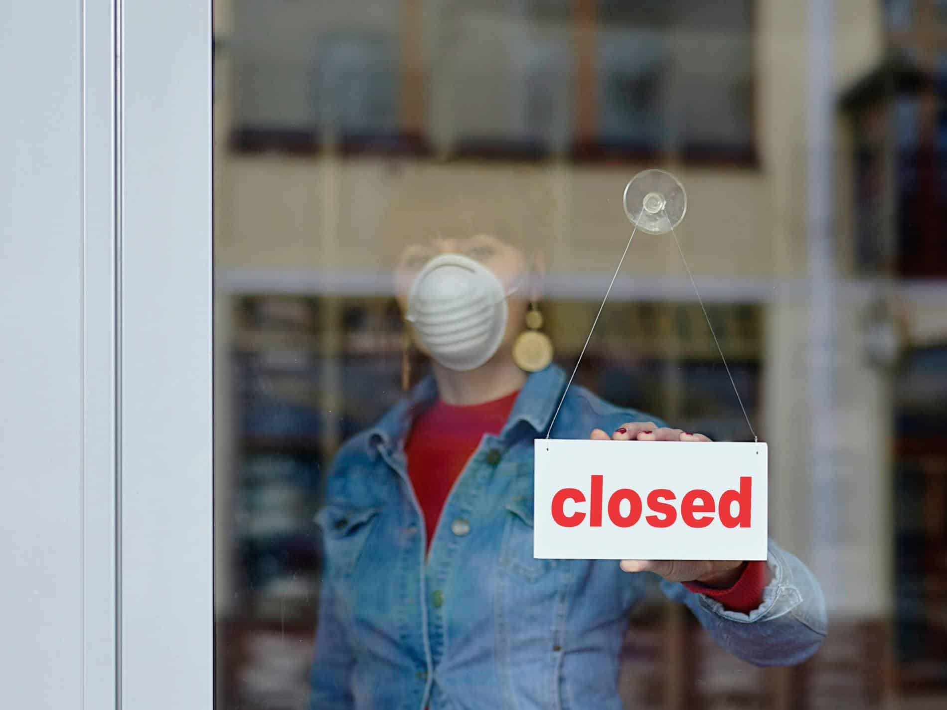 
                     woman in closed shop with mask - your text closed
                     