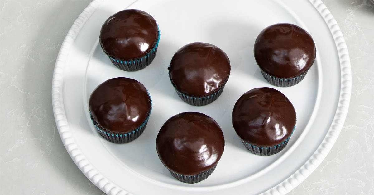 These super-chocolaty cupcakes are crowned with a delicious chocolate glaze