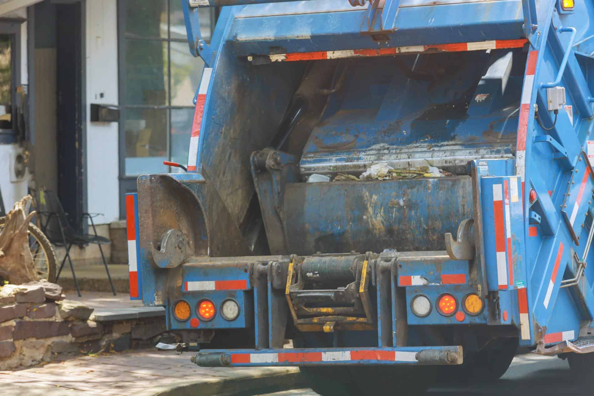 
                     Urban municipal recycling garbage collector truck waste trash bin
                     